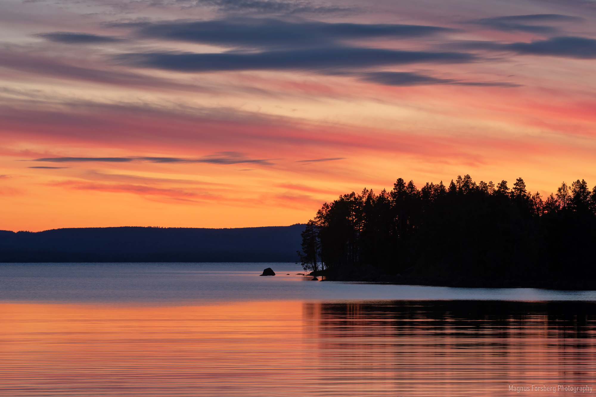 solnedgång över sjön Brehungen